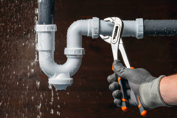 Professional Drain Cleaning technician working in Sharpes, FL